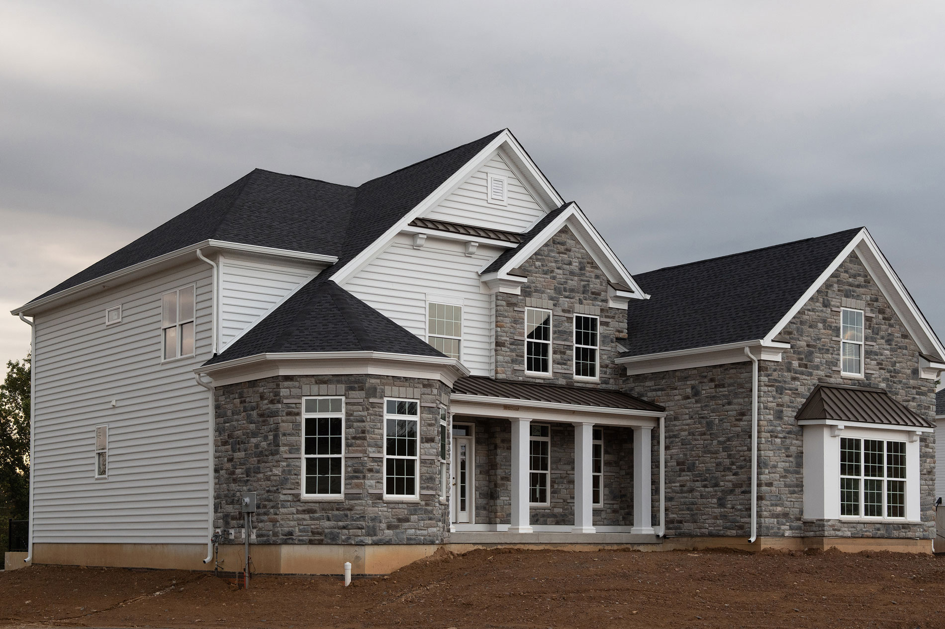 bigstock-Fasade-Of-A-New-House-A-Single-387817258